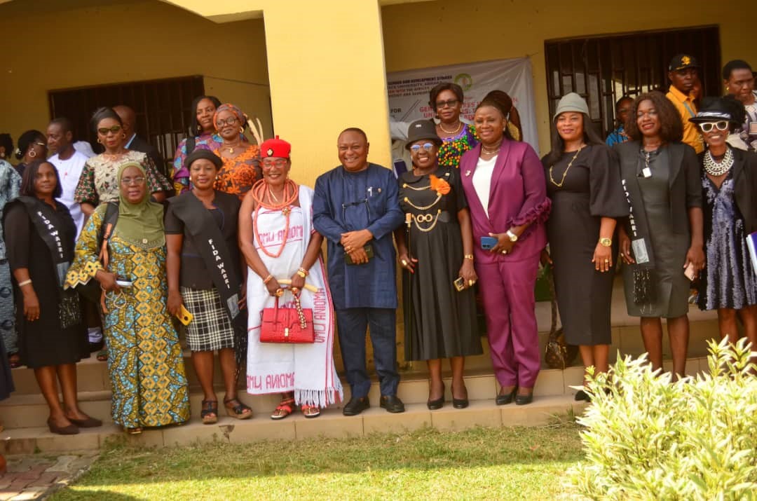 Omu Anioma, Obi Martha Dunkwu (4th Left), DELSU V-C, Prof. Andy Egwunyenga (5th Left), Delta State Commissioner for Women Affairs, Hon. Princess Pat Ajudua (5th Right), Prof. Ufuoma Awhefeada (4th Left) and other dignitaries at a two-day maiden confe