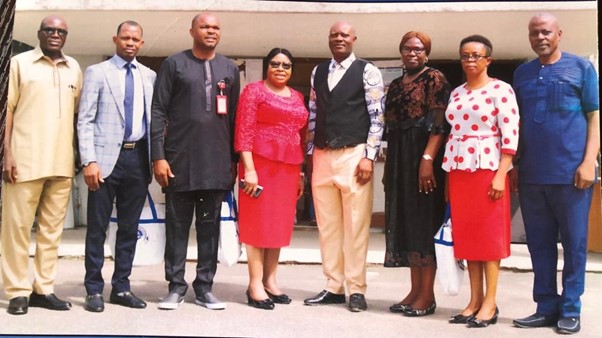 Group photograph of Management with the EFCC Team